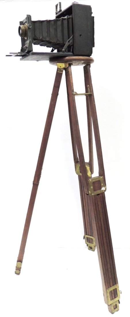 Folmer & Schwing speed graphic camera with tripod: Folmer Graflex wooden tripod No.4:36"h; camera:6.25"x3.5"lx7"w