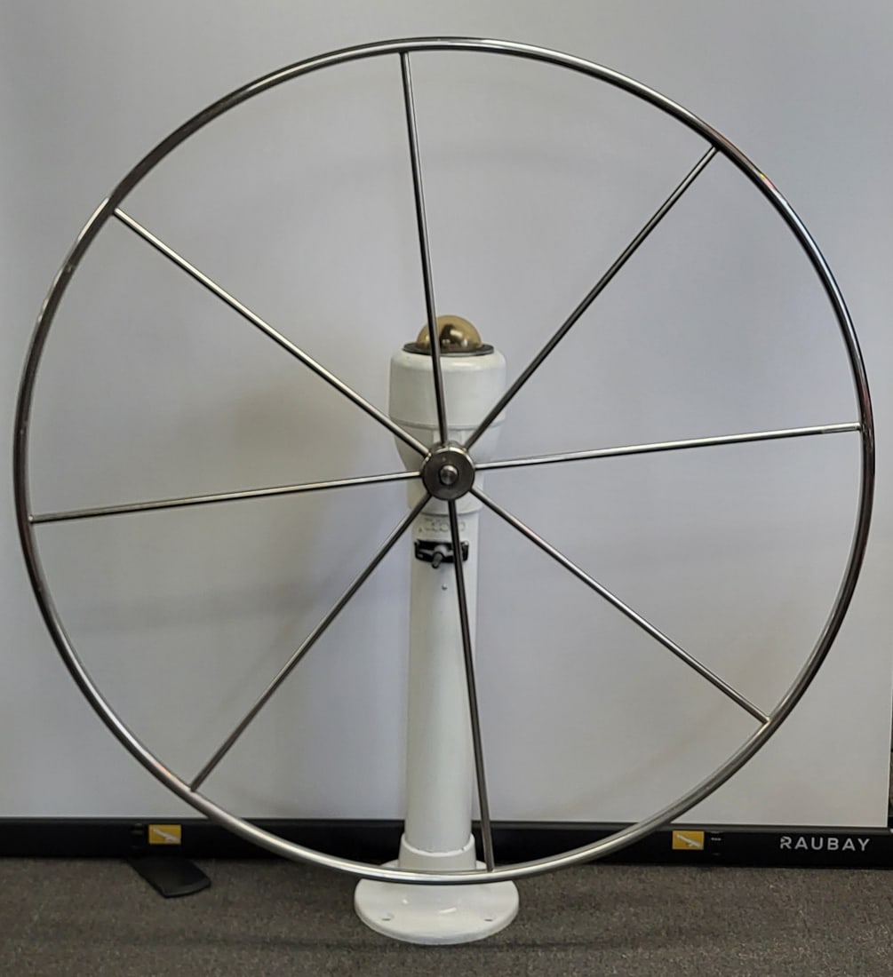 Edson Yacht Polished Chrome Wheel: Large polished chrome yacht wheel mounted to steering pedestal with attached compass. 52"h x 12"w