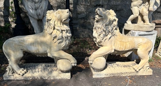 A Pair of Cast Stone Lions With Paw On Ball