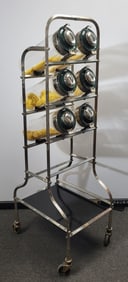 Mid Century six jar candy rack on a stainless steel stand.