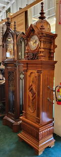Symphonium Model 38B Eroica Upright Three Disc Music Box with Clock, Extremely Rare: A Symphonium model 38B Eroica Upright Three Disc Music Box with Clock with three 13 5/8 inch disc mechanisms, diametric combs and dome, includes twelve sets of three discs. Walnut, ebony and fruitwood