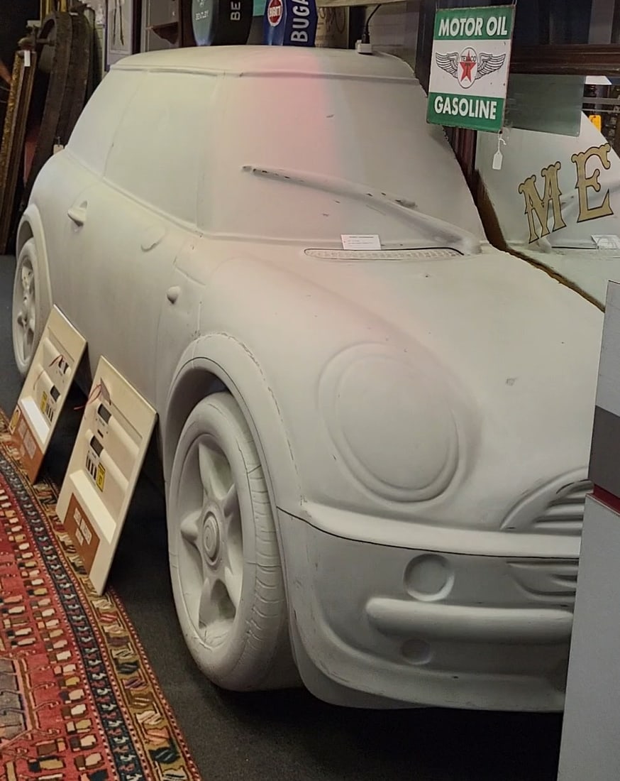 Half of a full size mold of a Mini Cooper it's an open canvas and can be a great statement piece. (1 of 1)
