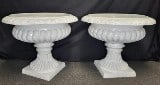 A pair of white fluted urns in cast aluminum 19"h x 24"d: A pair of white fluted urns in cast aluminum 19"h x 24"d