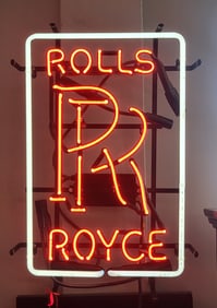 Rolls Royce neon dealer sign with RR and the words Rolls Royce in neon.