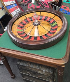 Very rare vintage roulette wheel marked A Ball & Bro Makers, Chicago.  It features a cheater button