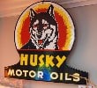 Single face Husky Motor Oil Sign in Porcelain. 14" H x 12" W