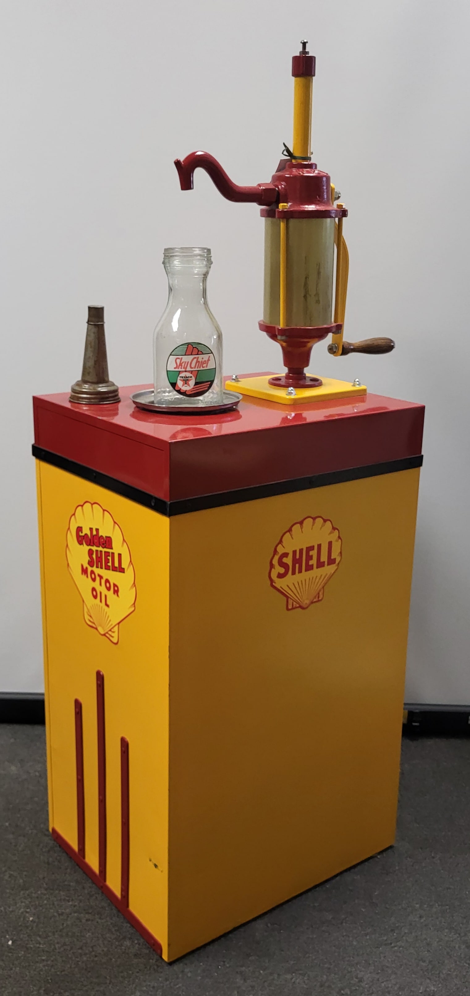 Shell Oil Pump Display Hand crank pump, file cabinet base. 30" h x 14.5" w x 18" d: Shell Oil Pump Display Hand crank pump, file cabinet base. 30" h x 14.5" w x 18" d