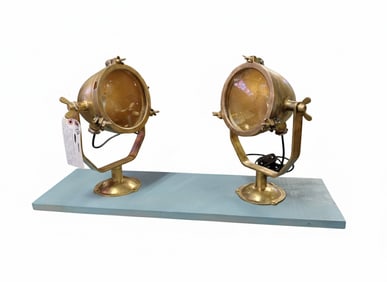 Pair of bronze ship lights circa 1940. They can be mounted as sconces or post lights. Eash 14"H x