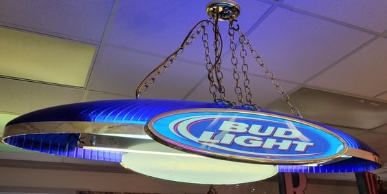 Large oval blue and white Bud Light drop down saloon light. 50" w x 18" w x 5 ft Drop