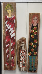 Martha Cassels, American 20th Century artist.  Folk Art figures painted on weathered planks. Dated