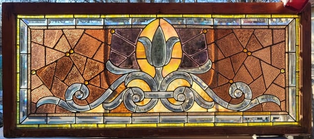 Antique American Milwaukee beveled and stained glass window with a clear glass tulip in the middle.