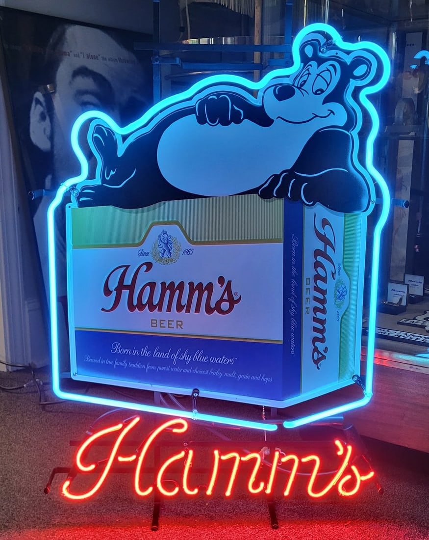 Hamms Beer Neon Sign, Light blue and red glass neon tubing drawing a bear laying on top of a Hamm's (1 of 2)