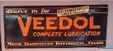 VEEDOL Complete Lubrication, registered in Glasgow, U.K master brand this sign reads; "Drive in for: VEEDOL Complete Lubrication, registered in Glasgow, U.K master brand this sign reads; "Drive in for Veedol Complete Lubrication!" on a dark blue and their classic orange font. 10" H x 23" W