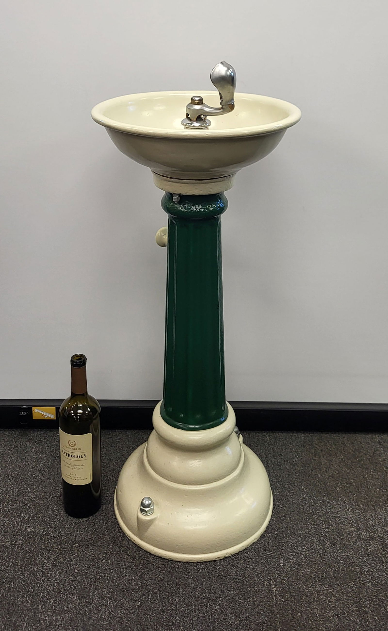 Antique restored pedestal drinking fountain on a flute column base, dark gloss green, heavy irion. (1 of 3)