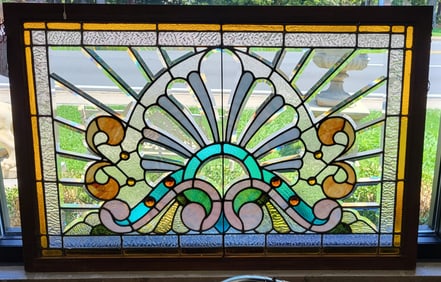 American beveled and stained glass window  28"H X 41"W