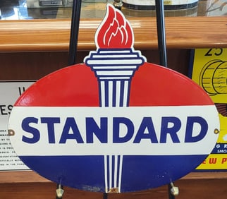 Standart Oil sign with torch logo in metal