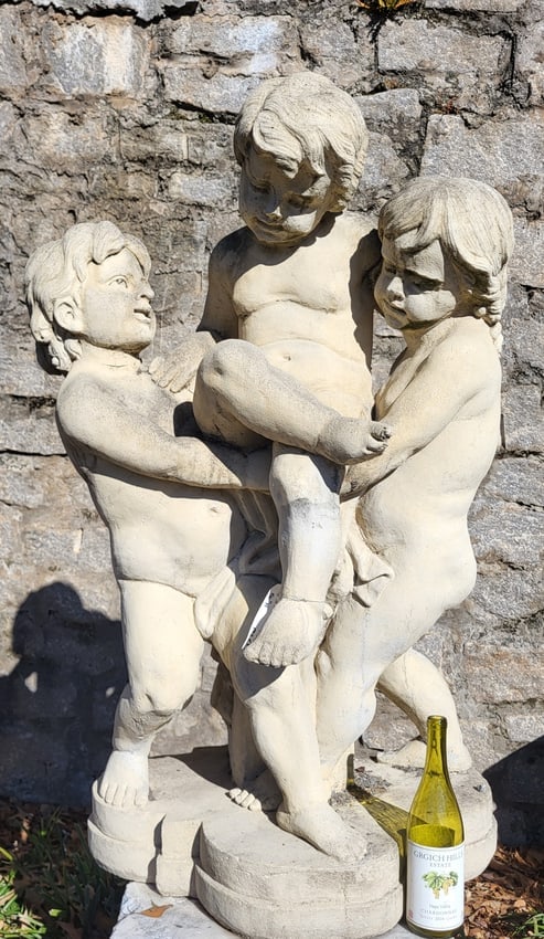 Fountain in cast limestone with 3 putti. 50" H x 32" W x 20" D: Fountain in cast limestone with 3 putti. 50" H x 32" W x 20" D