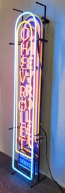 Chevrolet sales and service neon sign in blue and yellow. 44"H x 11"W