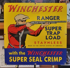Winchester Ranger Super Trap Load Porcelain/Enamel Sign with a man holding a rifle.