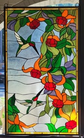 Stained glass window with red and orange flowers.  35"H x 21"W