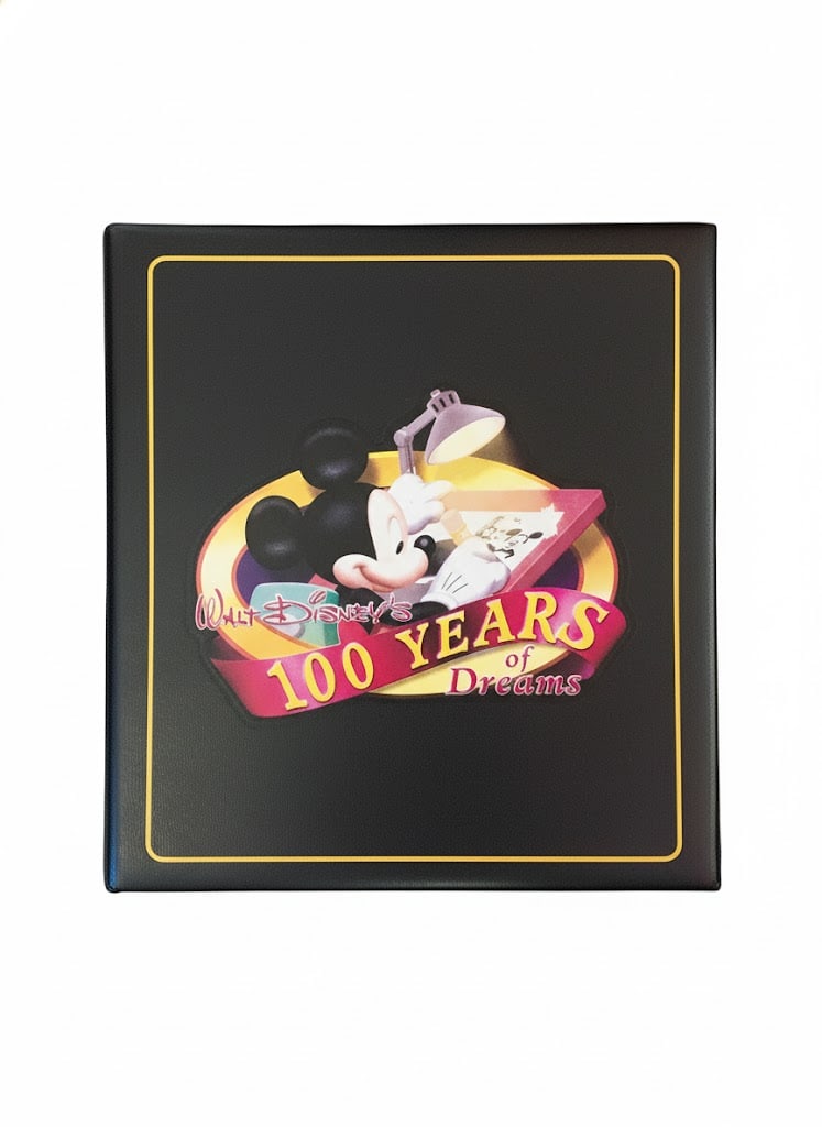 100 Years of Dreams in 3" Binder- 100 Pins in Several Pages.: Walt Disney: 100 Years of Dreams with Pages of Commemorative Pins. 20 Per Page. Measures: 12"H x 11"W x 3"D