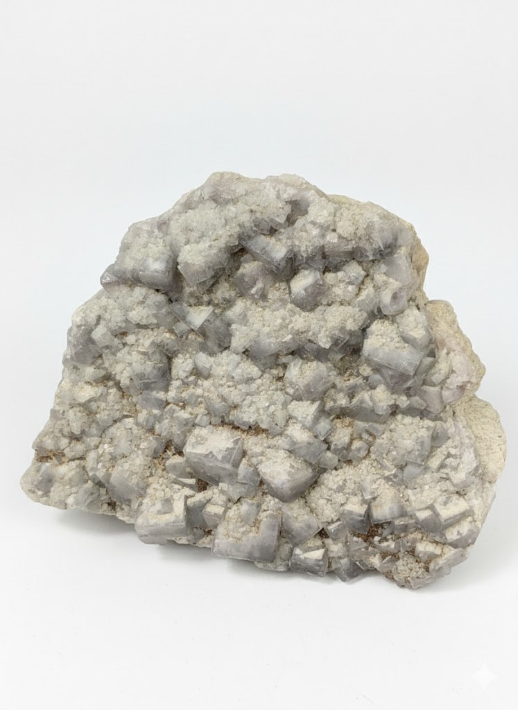 Fluorite on Solid Rock Formation: Fluorite Formation: Clear, White & Brown Hues to Formation. The: Fluorite on Solid Rock Formation: Fluorite Formation: Clear, White & Brown Hues to Formation. The pieces with a mass of small, rough-looking crystals on a rock base, showing distinct cubic forms are v