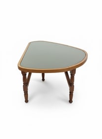 Elephant Ear - Style Coffee Table. Shape is Irregular. Wood is on Trim, Frame & Legs. Glass Top.