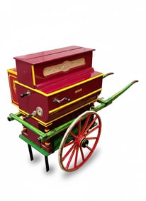 Faventia barrel piano on a cart, produced in Barcelona, Spain, by the Vicente Linares