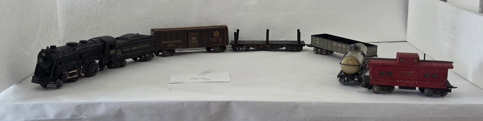 7-Piece Vintage O-Gauge Tinplate Train Set – New York Central Steam Locomotive & Cars: 7-Piece Vintage O-Gauge Tinplate Train Set – New York Central Steam Locomotive & Carswith Tender & Five Cars (Vintage Marx No. 999 Locomotive)
