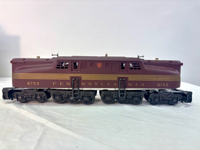 Lionel Pennsylvania F3A Dual Motor Diesel Locomotive #8971 in Original Box: Vintage Lionel Pennsylvania F3A dual-motor powered diesel (Tuscan red/gold stripes) plus matching non-powered unit in original box.