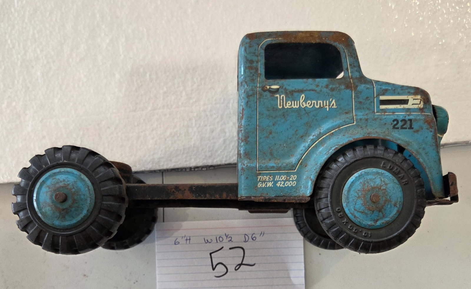 Vintage Blue Lumar Pressed Steel Newberry’s Delivery Toy Truck: Vintage Blue Lumar Blue Newberry’s 221 delivery truck with detailed graphics and balloon tires. Approx. 11”L