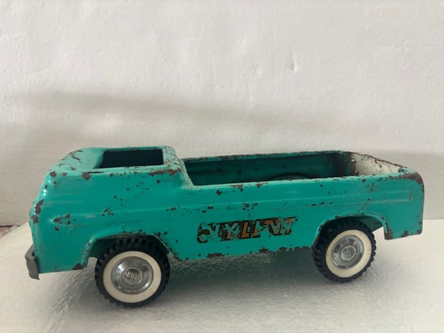 2 Vintage Nylint Pressed Steel Jungle Wagon/ Convertible Trucks: 2 Vintage Nylint Toys Convertible Trucks in turquoise and lime green, approx. 11”L
