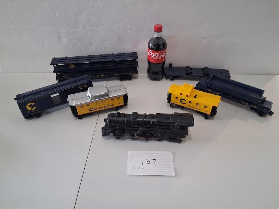 Marx Engine #1839 and 6 misc freight cars: Marx Engine #1839 (not rusty – plastic + diecast)