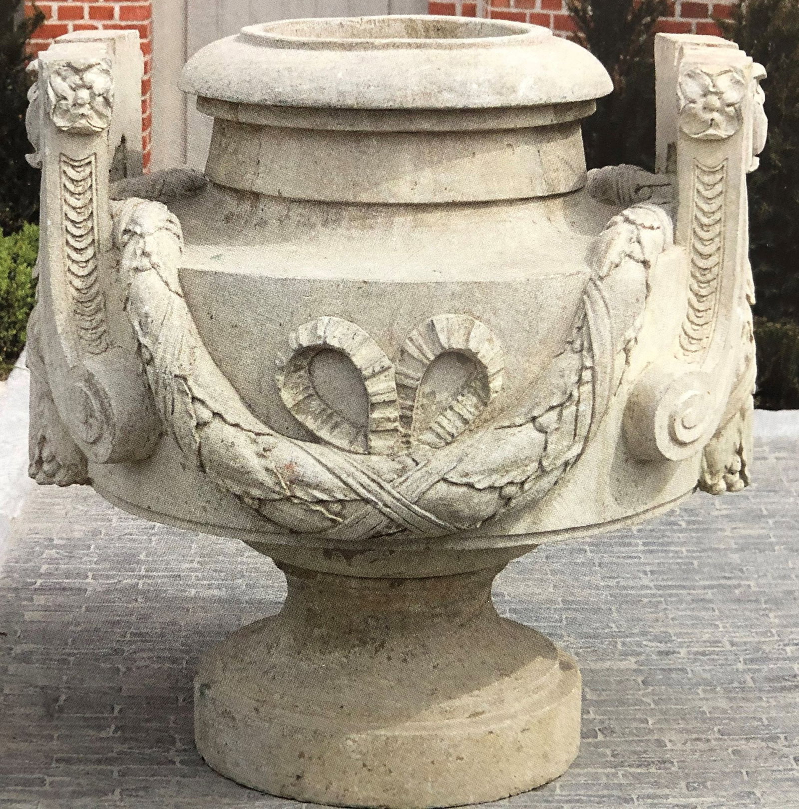 Monumental Belgian Cast Stone Urn: Belgian Cast Stone Urn with elaborate swags and Greek-style handles. (45" D x 44" H)
