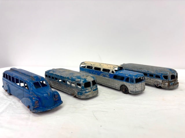 Group of 4 Vintage Die Cast Metal Buses by Tootsie Toys and Metal Masters: Group of 4 Vintage Die Cast Metal Buses by Tootsie Toys and Metal Masters. Bus sizes vary from 5" - 7" Long, original wheels in tact, see photos for details.