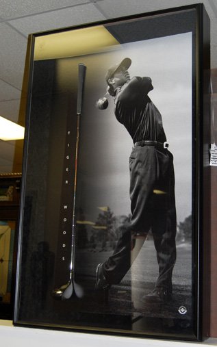 Tiger Woods museum mount club display: Tiger Woods museum mount club display with photo of Tiger in large shadow box with signed club. 54.5"H x 34"W x 7"D