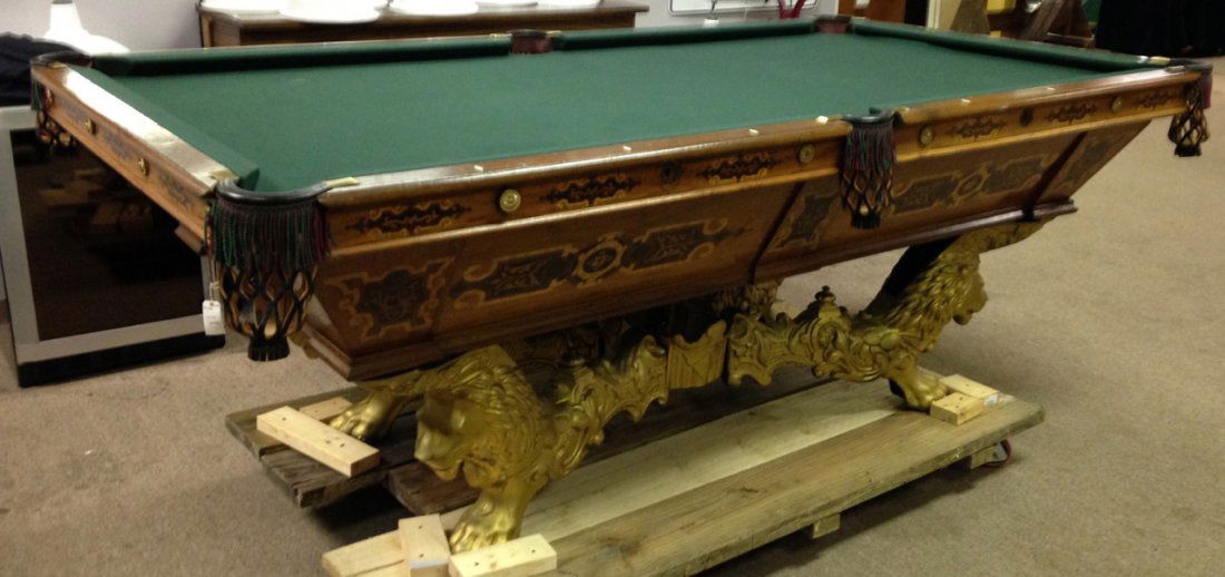 Brunswick pool table: Antique inlayed Brunswick pool table. Measures 101"x55 1/2" 37"
