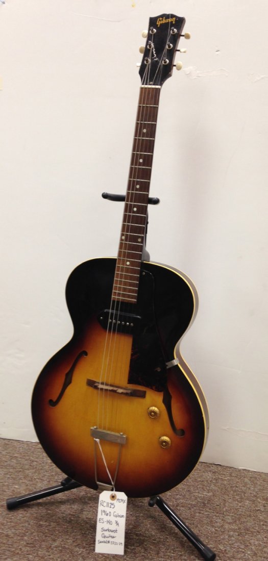 Antique Gibson Hollow body guitar: Gibson sunburst hollow body guitar model ES 140. Circa 1960.