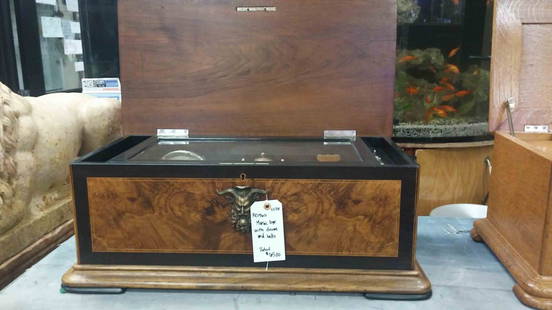 Music box w/ drum & bells: Wood and black w/ bearded and horned man bronze on front (11"H x 26"W x 15"D)