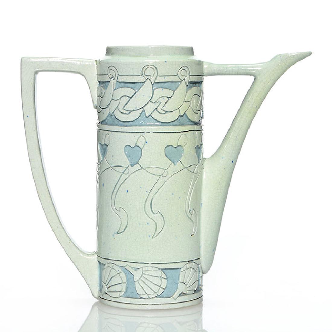 Roseville Della Robbia tea pot, hearts, fans, gray, 7: Roseville Della Robbia tea pot carved with tea cups and saucers, intaglio hearts on scrolling vines and several hand fans covered with a pleasing two tone gray glaze done by an artist with the initial