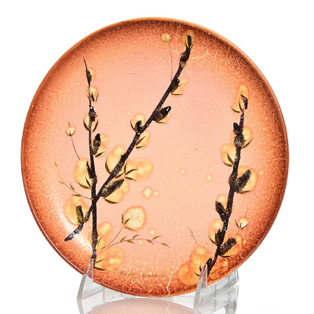 Sascha Brastoff porcelain plate, pussy willows, 8 1/2: Porcelain plate decorated with pussy willows with gold highlighting set against a mottled orange ground by Sascha Brastoff who’s full signature is done in gold. Otherwise unmarked. Excellent origina