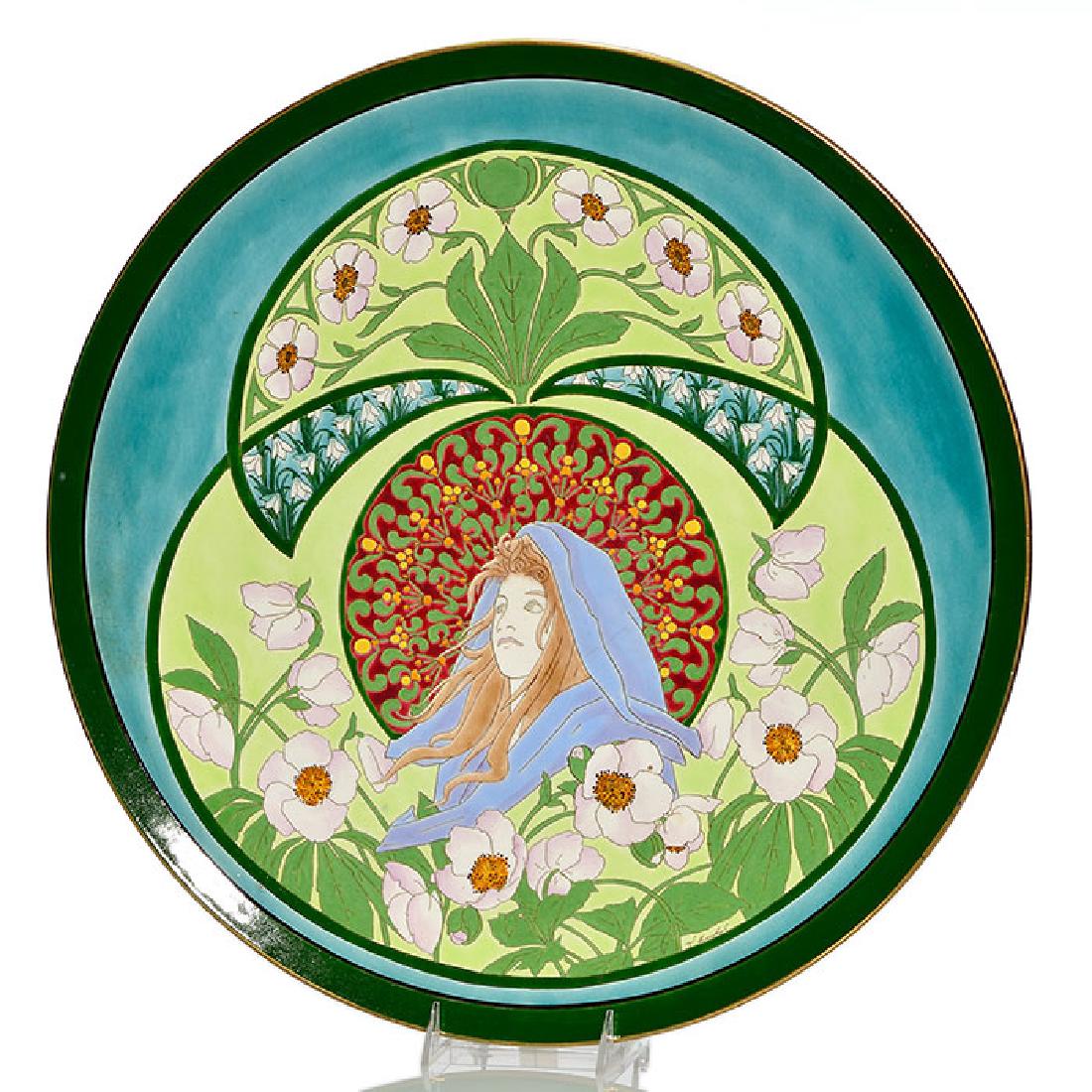 Keller & Guerin Art Nouveau charger, beautiful woman,: Monumental Keller & Grerin (attribution) Art Nouveau charger beautifully enamel decorated with a young maiden backed by an ornate medallion and white mallow flowers distributed above and below against