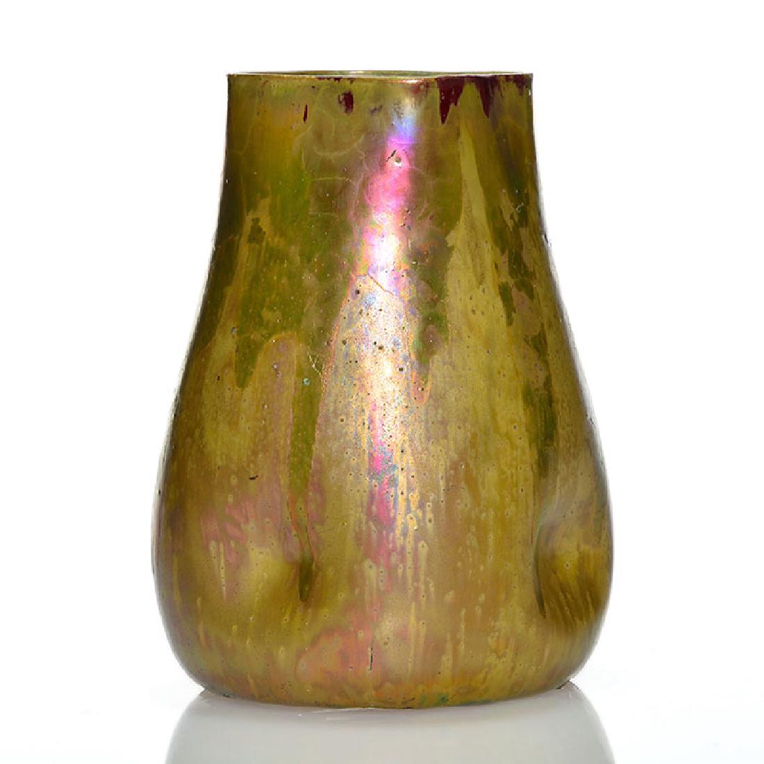 Clement Massier metallic glaze pinch vase, 1900, 4 7/8”: Clement Massier metallic glaze pinch vase done in 1900. Marked MCM Golfe Juan AM 1900 on the bottom. Height 4 7/8 inches. Interesting drip glaze. Minor touch up to tiny glaze nick on rim. 1/8 inch gla