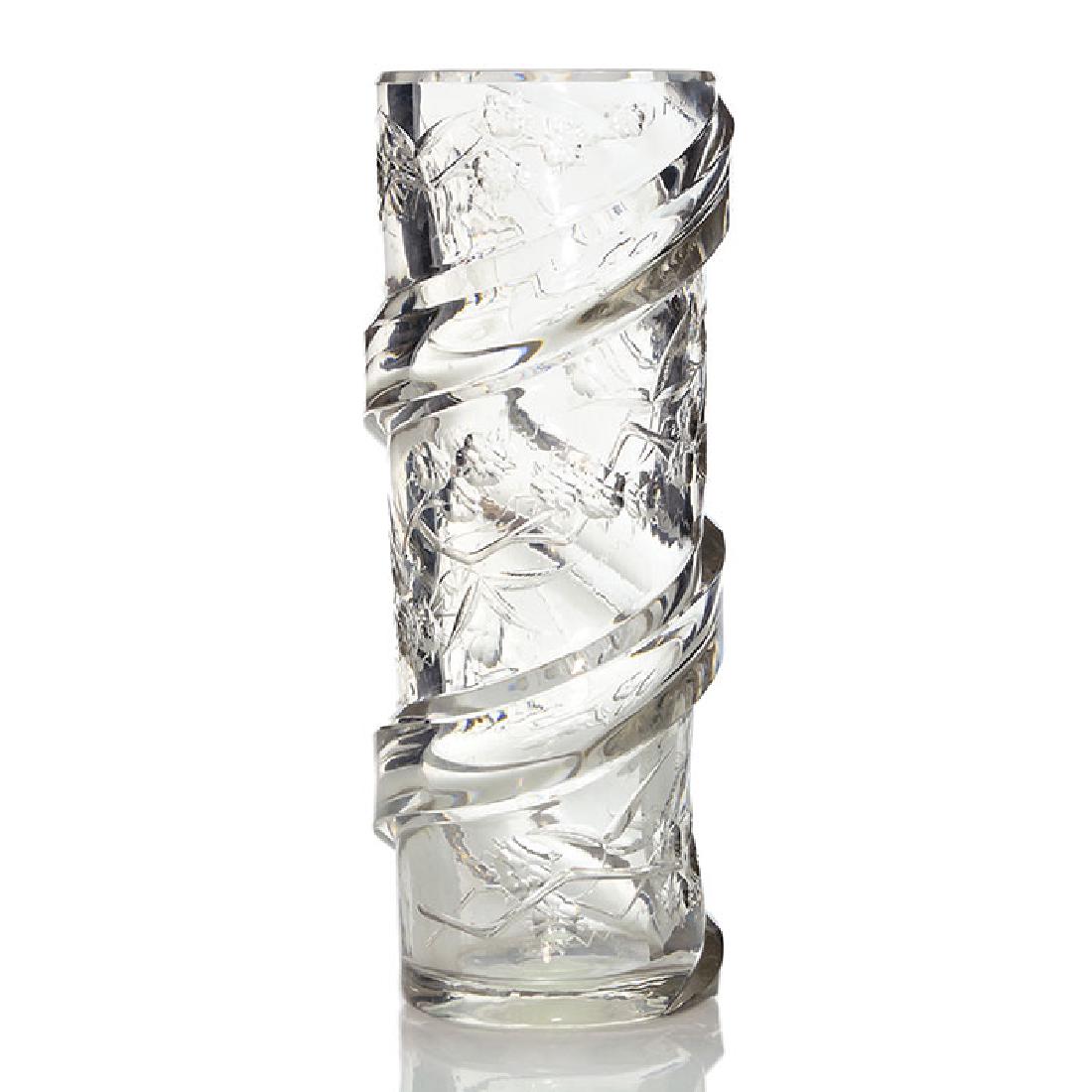 French crystal vase, intaglio flora & fauna, bands, 10: French crystal vase intaglio carved with flora and fauna including the birds and the bees and a thick spiraling polished glass band. Height 10 1/8 inches. Unmarked. Mild interior cloudiness and a few 