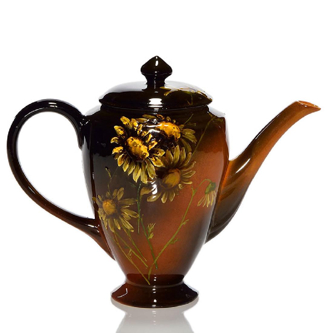 Rookwood Standard coffee pot, Zettel,1893, 555, 7: Standard glaze lidded coffee pot decorated with daisies, the work of Josephine Zettel in 1893. Marks include the Rookwood logo, which indicates the date, shape 555, an impressed W for White clay and M