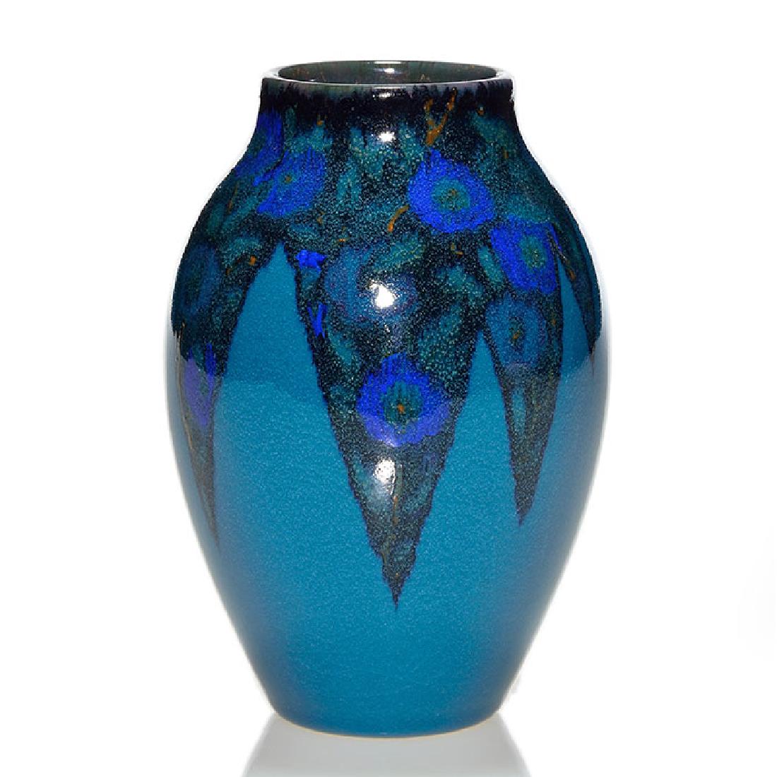 Rookwood Blue Tint vase, Sax, 1928, 604 F, 6 1/8 inches: Blue Tint Porcelain vase with bright blue and purple flowers cascading down over the turquoise ground and lined with an iridescent glaze, the work of Sara Sax in 1928. Marks include the Rookwood logo,