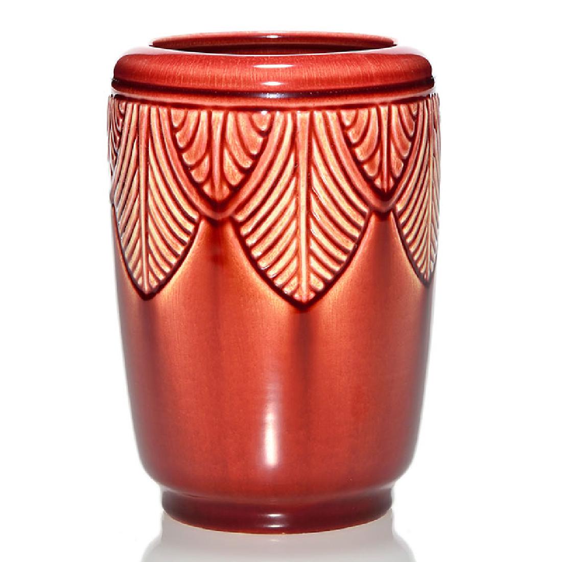 Rookwood Oxblood vase, Menzel design, 1938, 6700, 5 1/2: Rookwood Oxblood vase done on an Earl Menzel production form in 1938. Marks include the company logo, the date and shape nyumber 6700. Height 5 1/2 inches. Uncrazed with a very consistent glaze. Done 