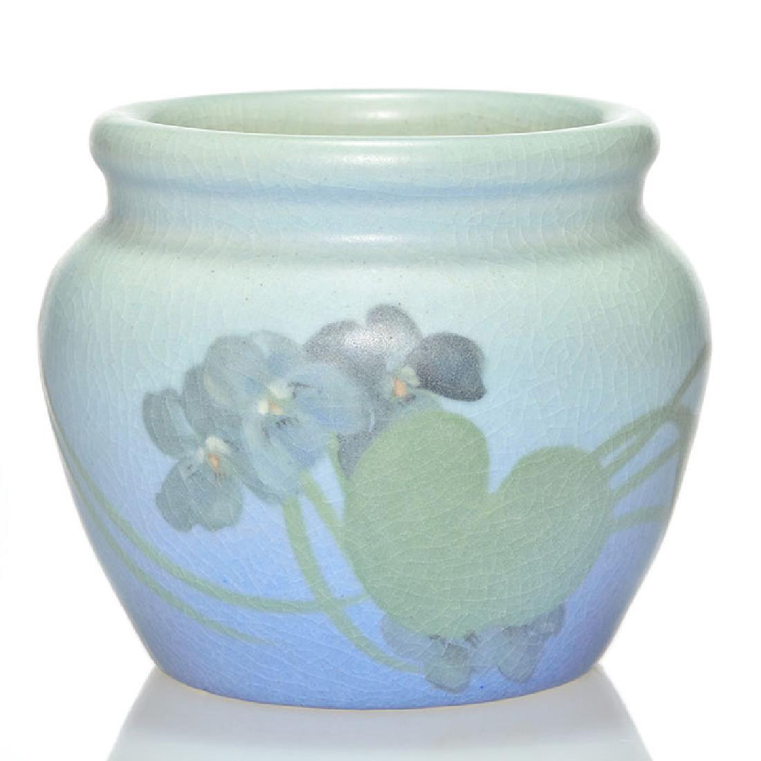 Rookwood Vellum, 1904, Mitchell, shape 966, floral, 3: Vellum glaze vase decorated with violets, the work of Marianne Mitchell in 1904. Marks include the Rookwood logo, date, shape 966, an impressed V for Vellum and Ms. Mitchell’s incised monogram. Ther