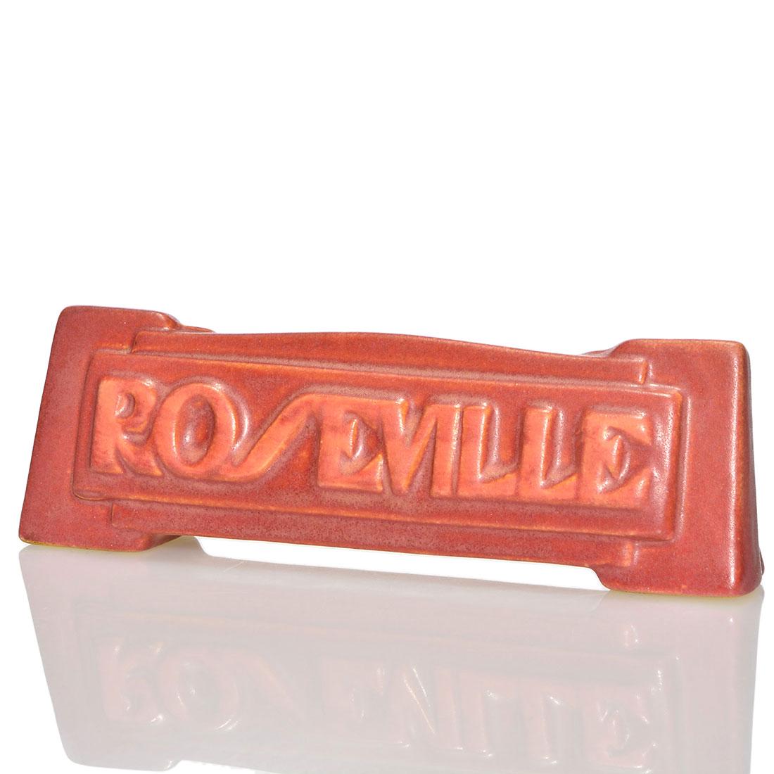 Roseville Deco 2" X 6 1/4" dealer advertising sign (1 of 1)