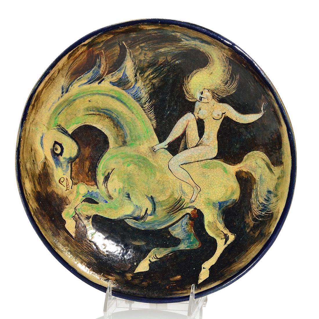 Aaron Bohrod charger, Lady Godiva on stallion, 12 3/8": Aaron Bohrod charger revealing a spirited greenish white stallion with Lady Godiva (or perhaps Lady Gaga) riding on his back. Mr. Bohrod incised his signature and the date 1950 below the horse's head.